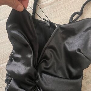 Fashion nova NWT xsmall black low cut front v dress and high slit silk